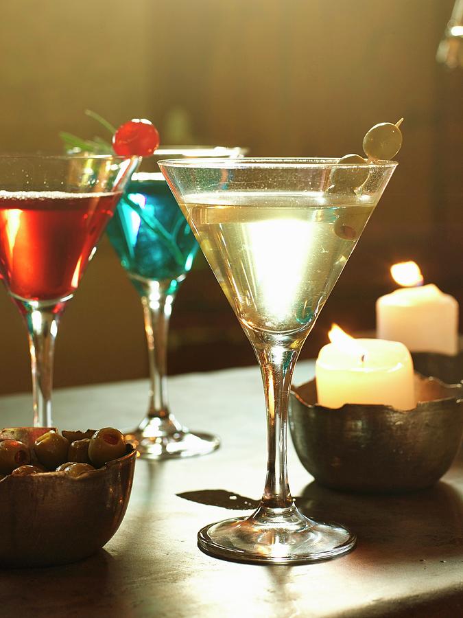 Christmas Cocktails And Burning Candles Photograph by Great Stock!