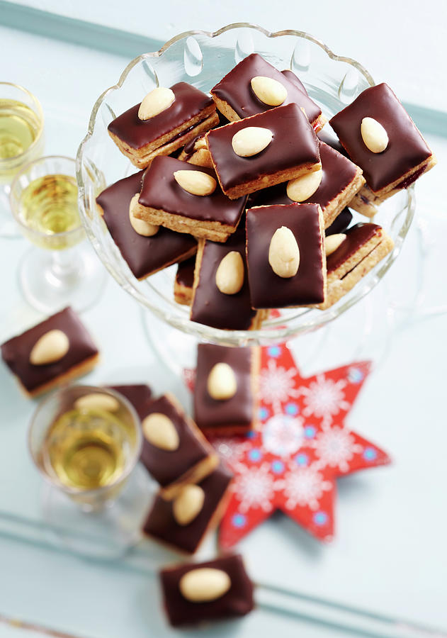 Christmas Cookies With Chocolate And Almonds Photograph by Teubner Foodfoto