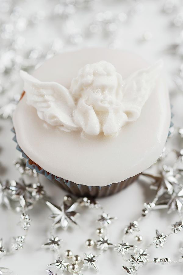Christmas Cupcake, Decorated With A Fondant Icing Angel Photograph by Ewa Rejmer