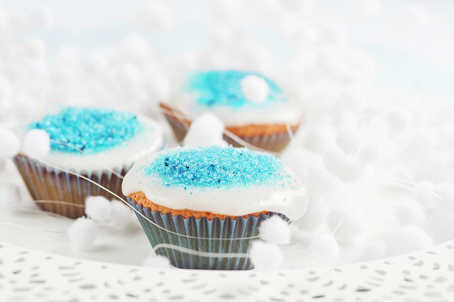Christmas Cupcakes Decorated With Blue Sugar Photograph by Ewa Rejmer