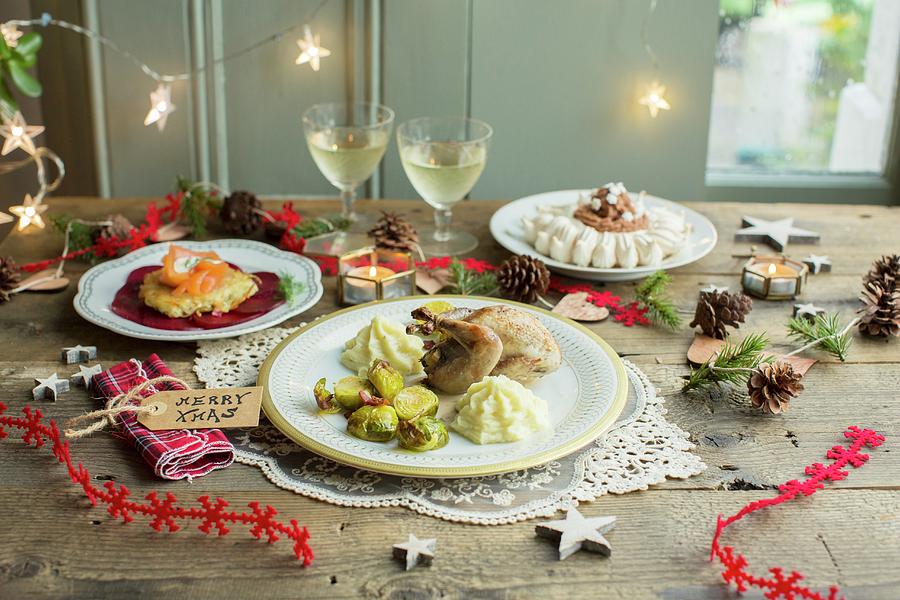 Christmas Dinner: Potato Cakes With Smoked Salmon And Beetroot, Quail With Brussels Sprouts And Chestnut Pure And Mont Blanc Pavlova With Chestnut Cream Photograph by Anne Faber