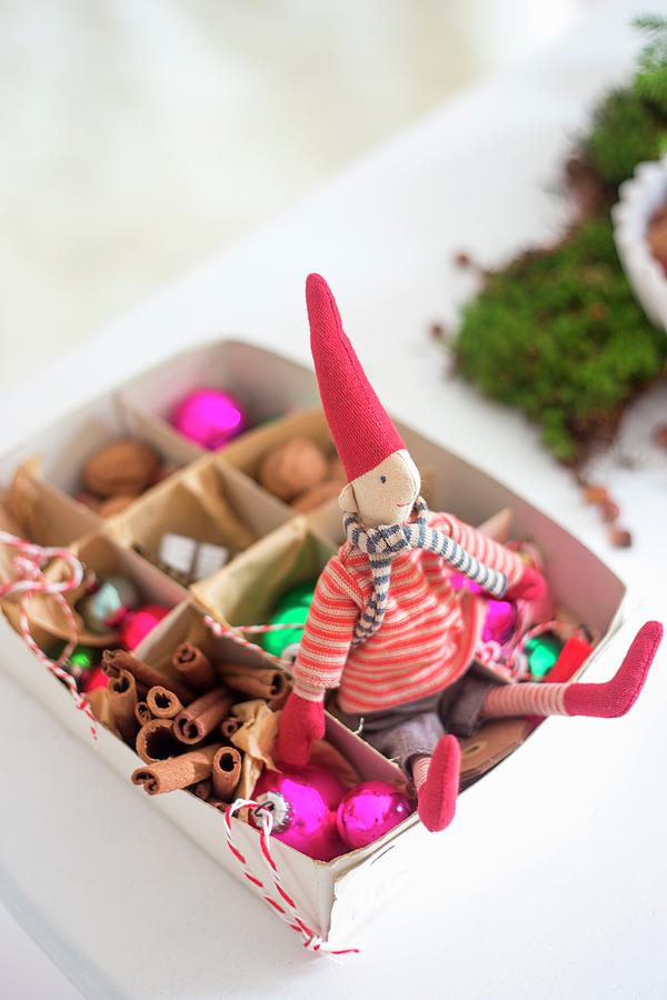 Christmas Elf And Baubles In Box Photograph by Syl Loves