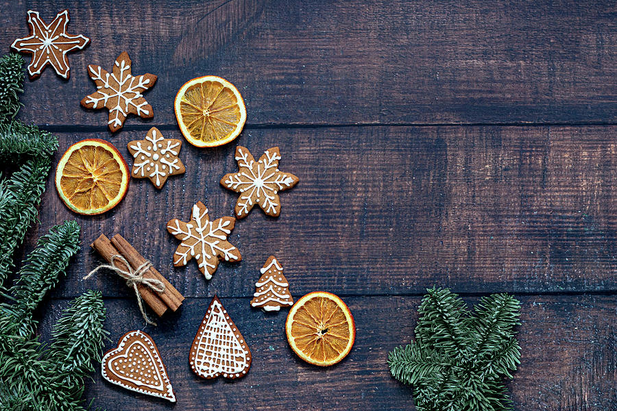 Christmas Gingerbread Cookies With Dried Oranges And Cinnamon Sticks Photograph by Karolina Nicpon