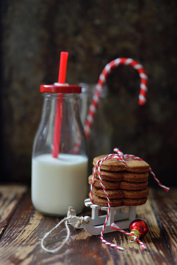 Christmas Gingerbreads With A Bottle Of Milk Photograph by Karolina Smyk
