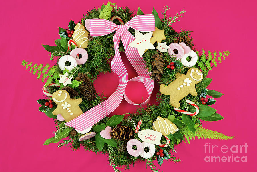 Christmas holiday wreath with cookies. Photograph by Milleflore Images