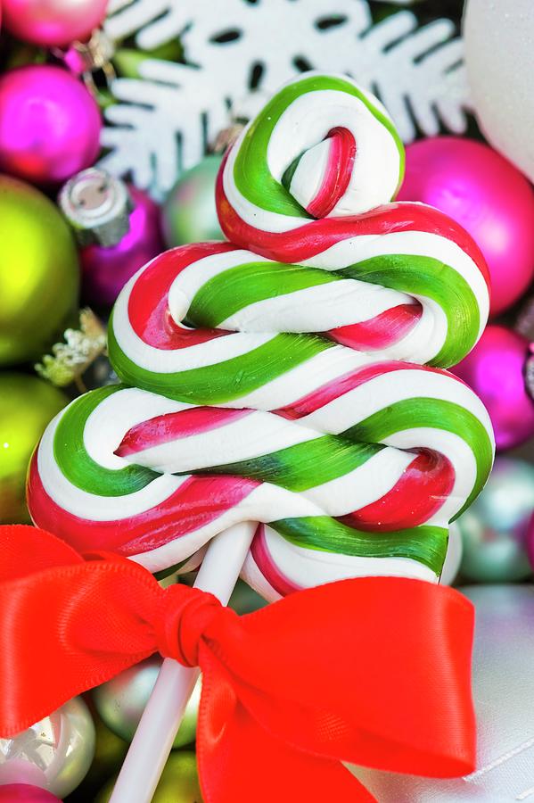 Christmas Lollipop On Baubles Photograph by Burgess, Jasmine