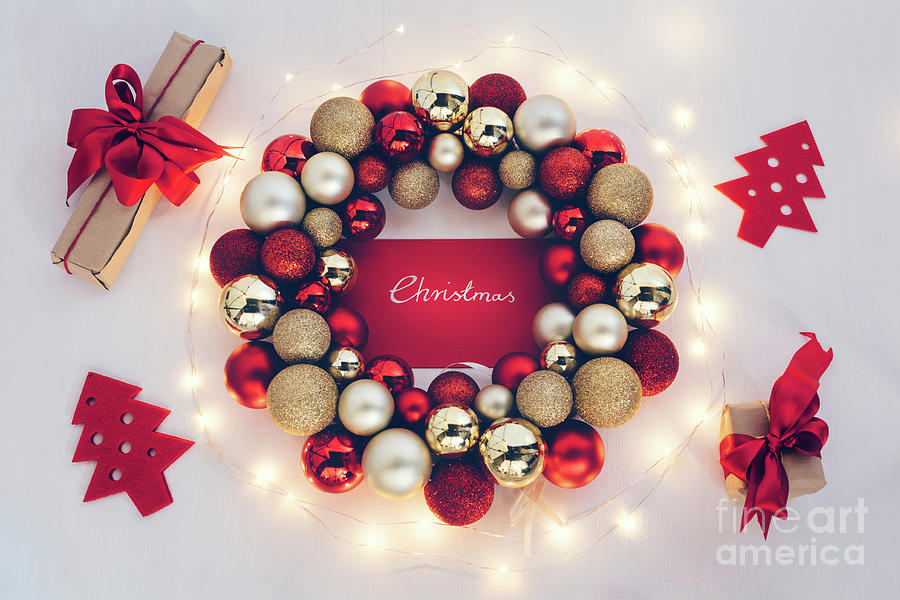 Christmas ornament with fairy lights and gifts Photograph by Michal Bednarek