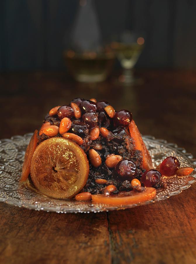 Christmas Pudding With Candied Fruits And Almonds Photograph by Hugh Johnson
