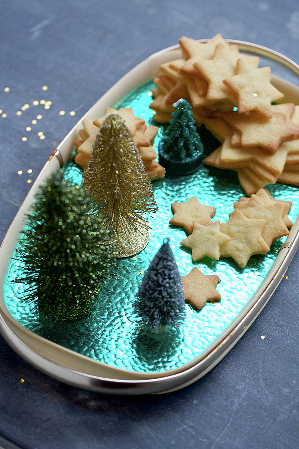 Christmas Star Biscuits On A Turquoise Tray Photograph by Sabine Mader