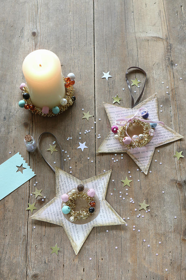 Christmas Stars Handcrafted From Coloured Book Pages Decorated With Beads And Glitter Photograph by Regina Hippel