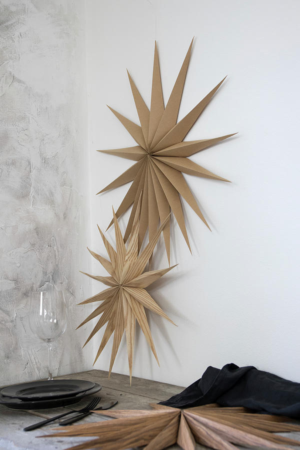 Christmas Stars Made From Wood Veneer Decorating Wall Photograph by Astrid Algermissen
