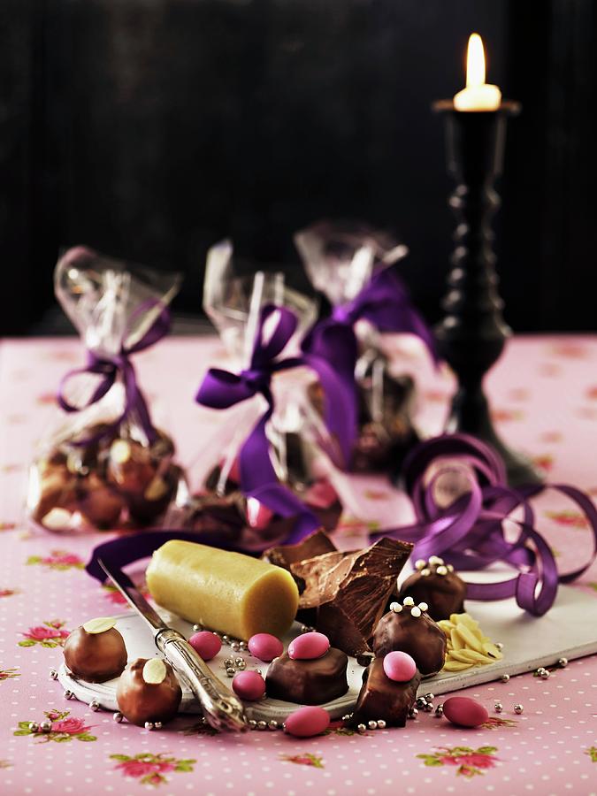 Christmas Sweets In Small Cellophane Bags With Ingredients For Making Them Photograph by Mikkel Adsbl