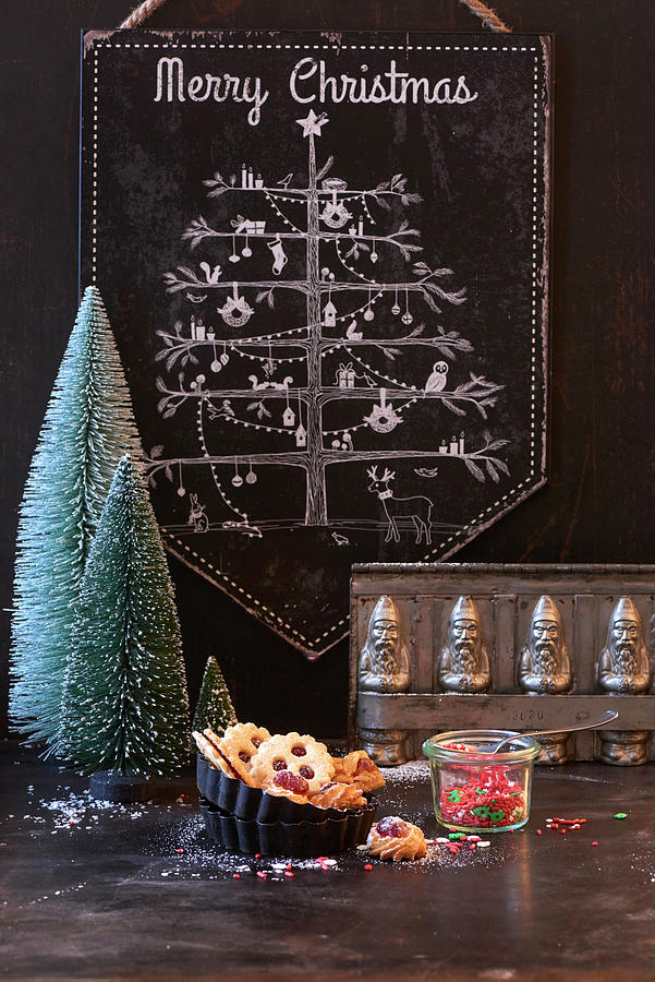 Christmas Tree On Chalk Board, Small Christmas Tree Ornaments, Biscuits And Vintage Flan Tins Photograph by Inge Ofenstein