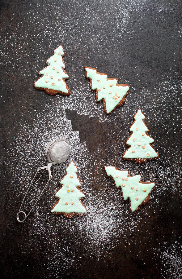 Christmas Tree Shaped Gingerbread Cookies With Icing, Confetti And Dusted Sugar On Top Photograph by Kati Finell