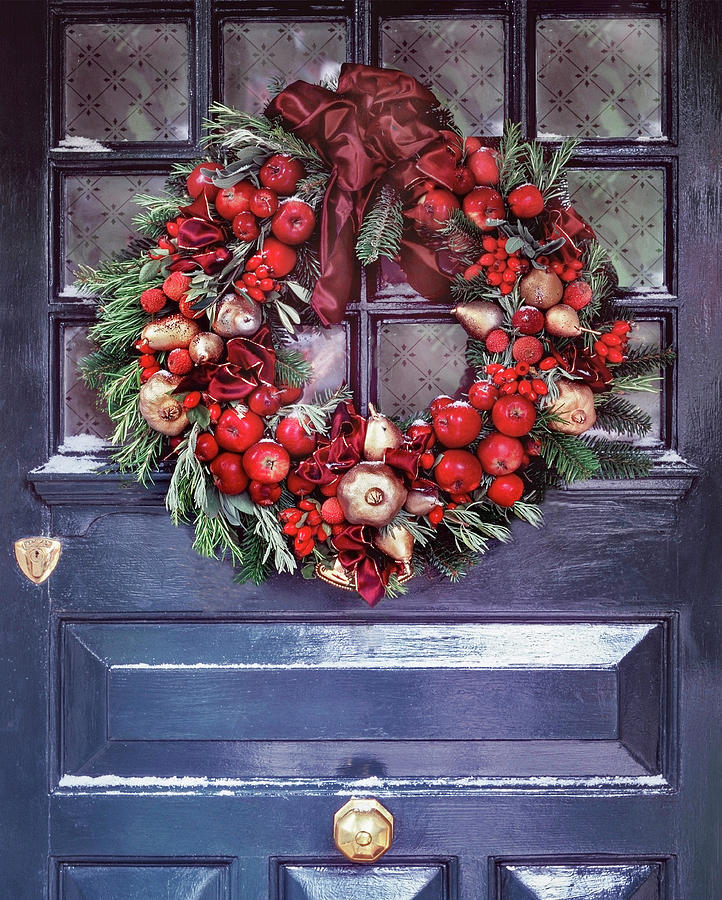 Christmas Wreath On Grey Door With Golden Pears And Red Apples Fruits And Berries Photograph by Michael Paul