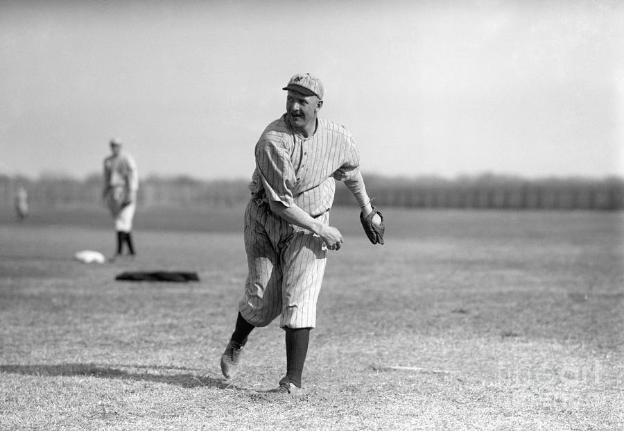 Christy Mathewson Pitching On Field Photograph by Bettmann
