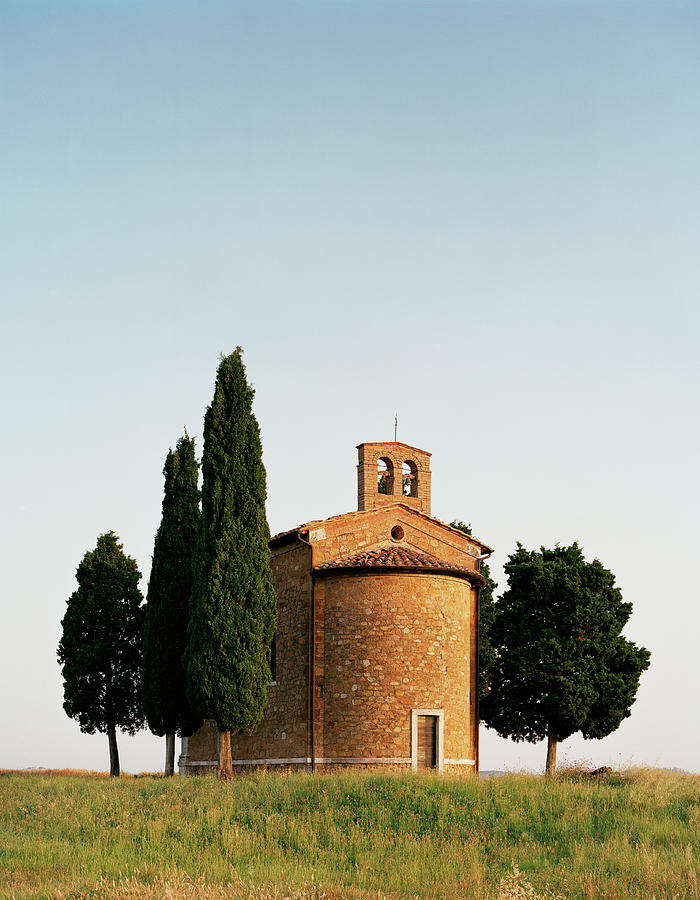Church And Cypress Trees In The Photograph by Gary Yeowell