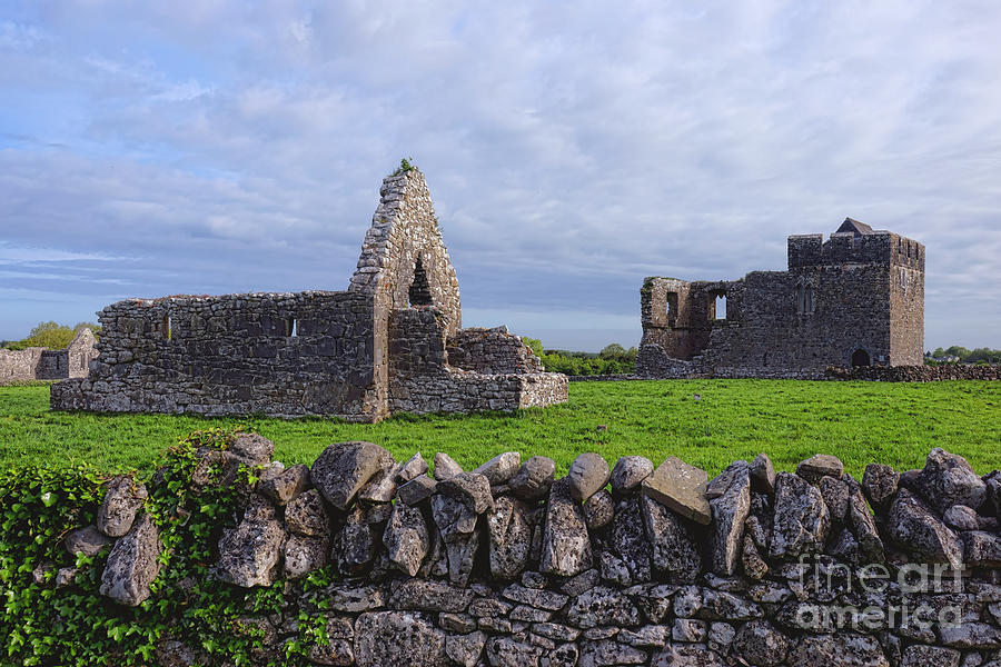Church of St John the Baptist and Glebe House at Kilmacduagh Mon Photograph by Olivier Le Queinec