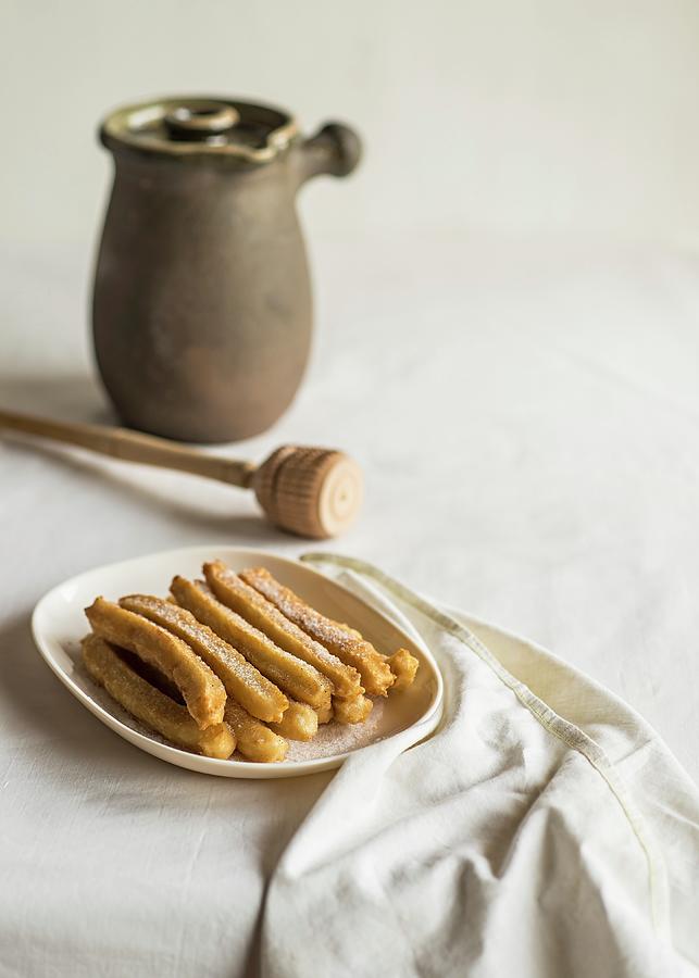 Churros deep-fried Spanish Pastries On A Plate Photograph by Miriam Garcia