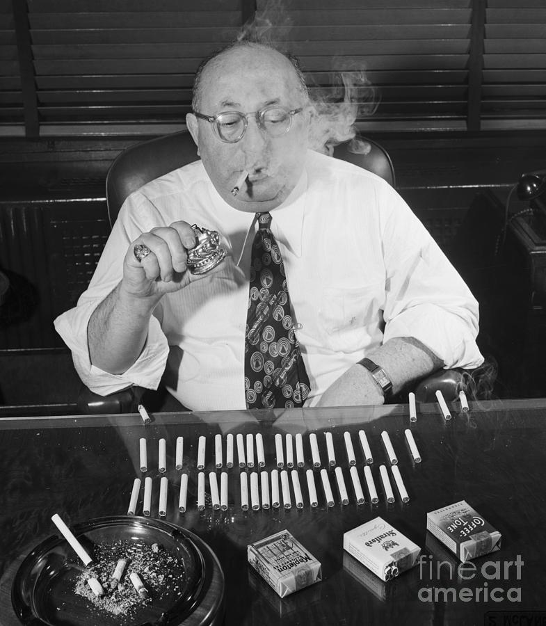Cigarette Authority Smoking One Photograph by Bettmann