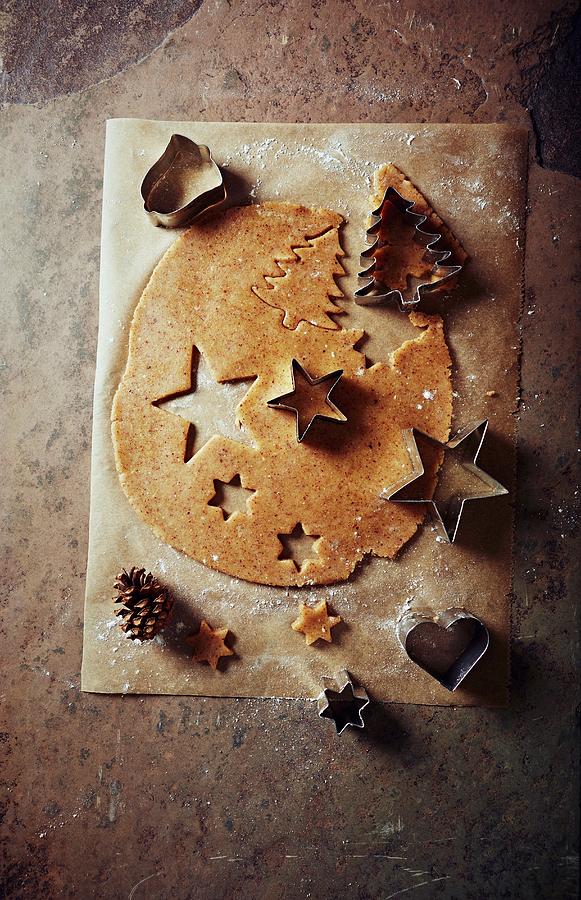 Cinnamon Dough With Christmas Cookie Cutters Photograph by B.&.e.dudzinski