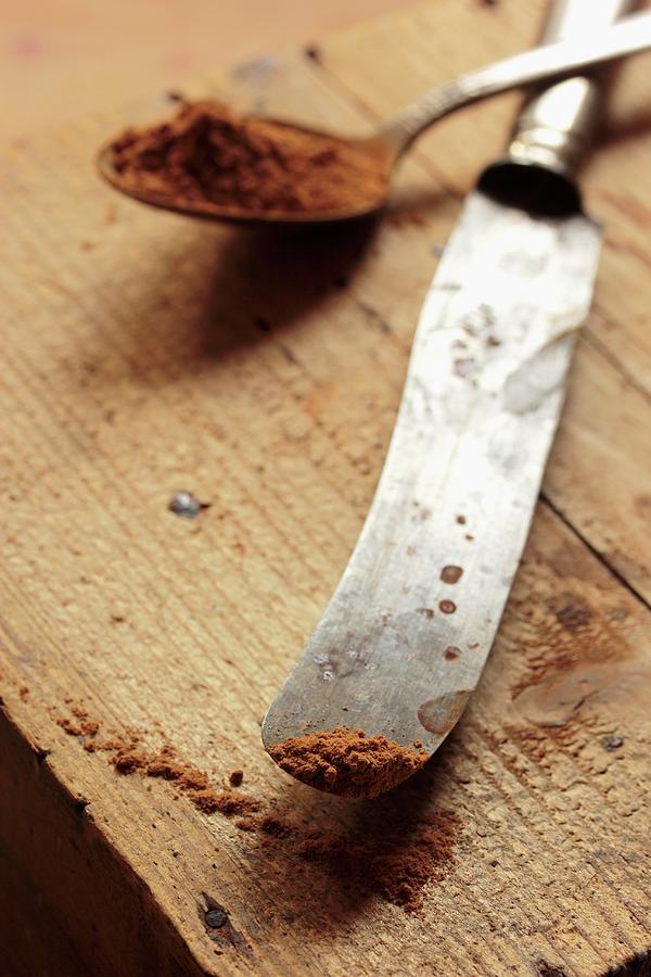 Cinnamon On A Spoon And On The Tip Of An Old Silver Knife Photograph by Vivi Dangelo