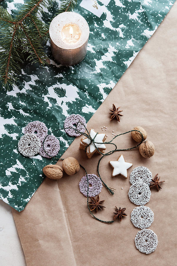 Cinnamon Star And Sugar Ring Biscuits, Star Anise, Walnuts And Candle Photograph by Jelena Filipinski