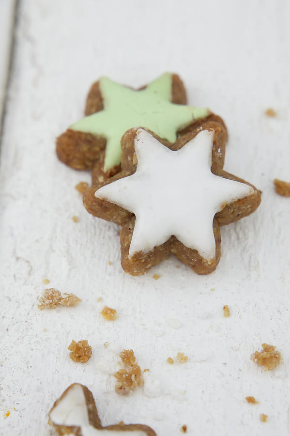Cinnamon Stars With White And Green Icing Photograph by Martina Schindler