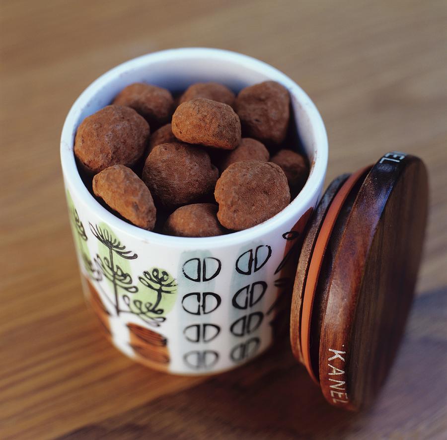 Cinnamon Truffles In A Storage Container Photograph by Tine Guth Linse
