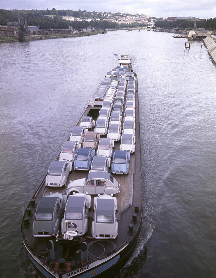 Transportation Photograph - Citroen Cars On A Barge by Ralph Crane
