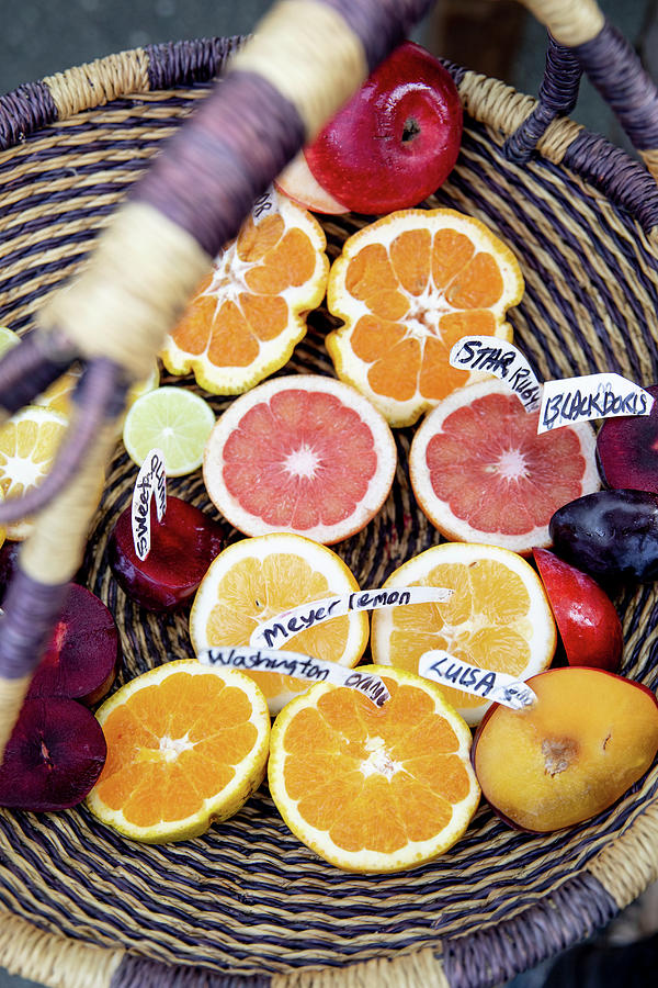 Citrus Fruit With Name Tags In A Basket Photograph by Claudia Timmann