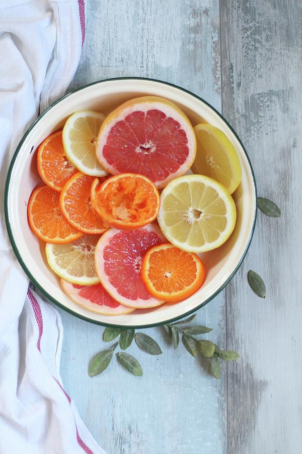 Citrus Fruits In An Enamel Bowl Photograph by Sylvia E.k Photography