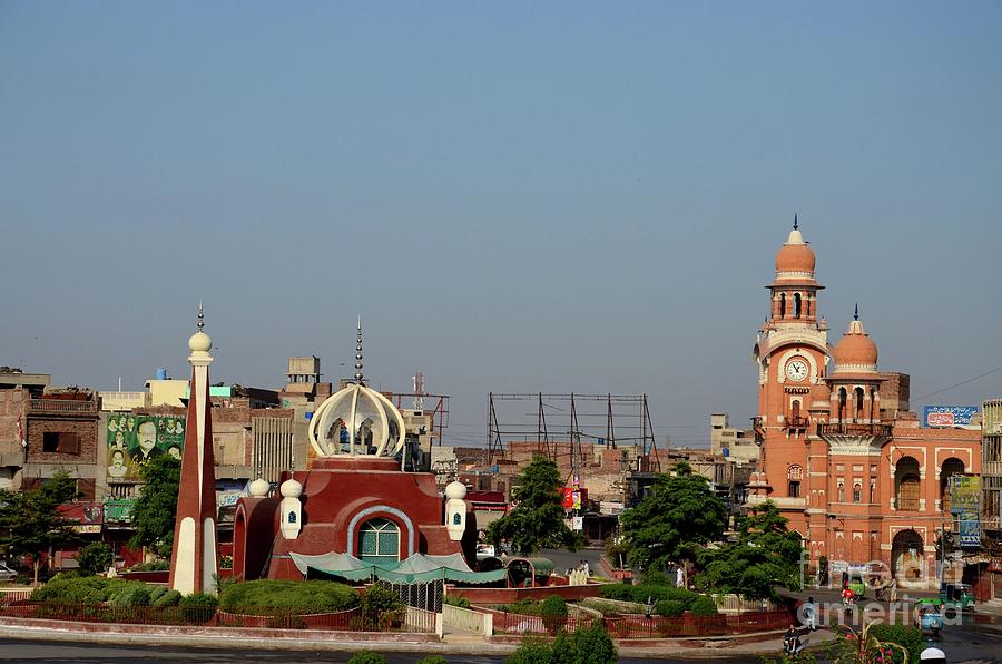 Architecture Photograph - City center with clock tower and contemporary mosque at roundabout Multan Pakistan by Imran Ahmed