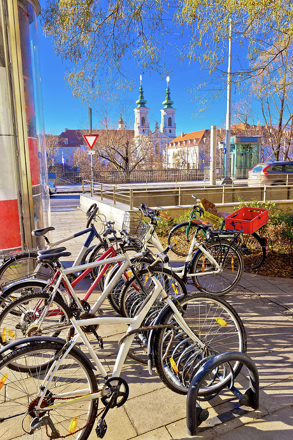 City of Graz bicycles by the Mur river colorful view Photograph by Brch Photography