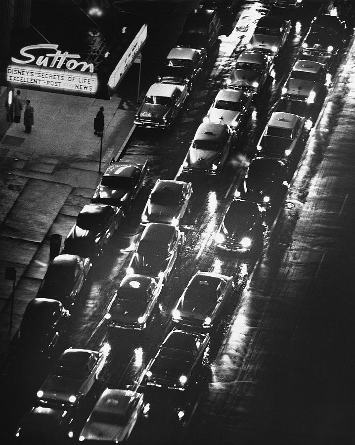 City Sreet W Cars On A Rainy Night Photograph by George Marks