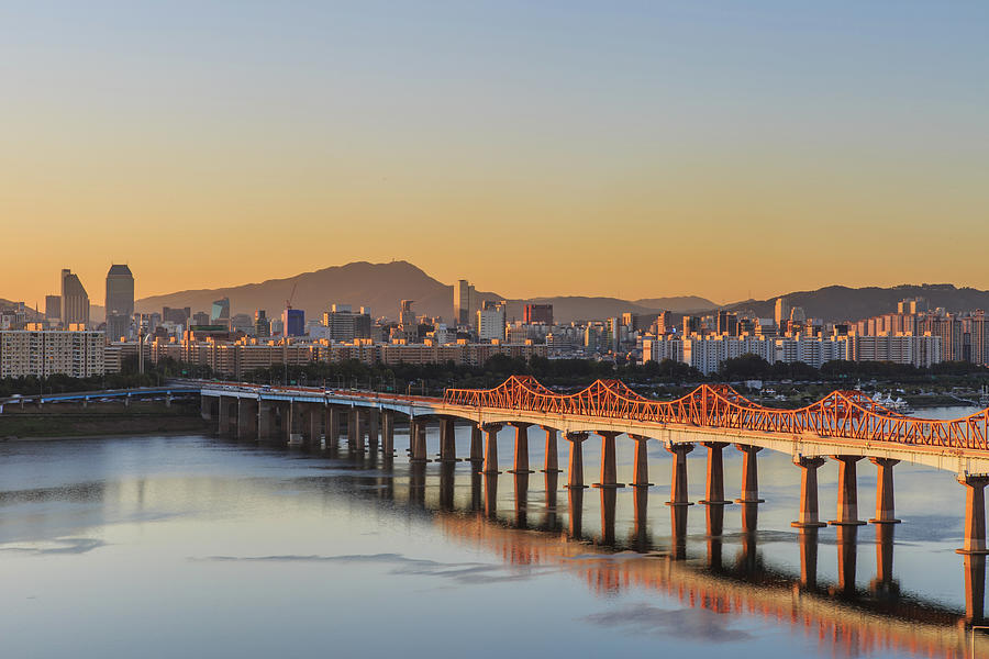 Cityscape With Warm Morning Light Photograph by Sungjin Kim