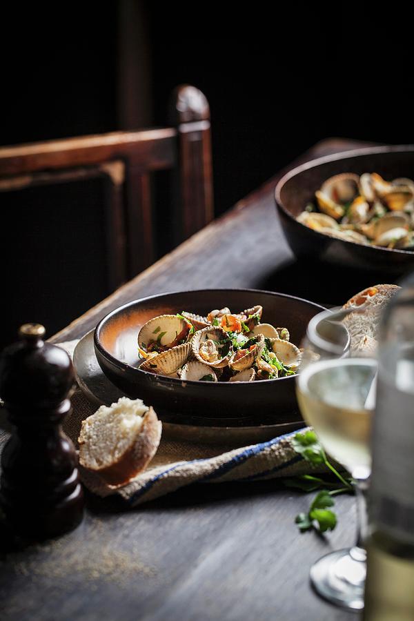 Clams In A Herb Sauce With White Bread And Wine Photograph by Malgorzata Stepien
