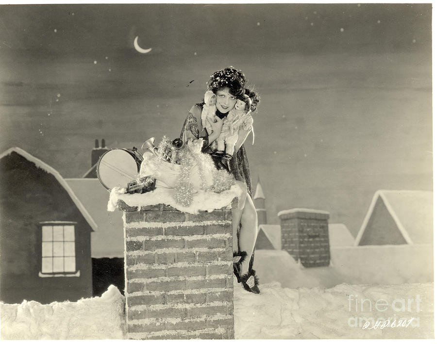 Clara Bow Sitting On Chimney With Toys Photograph by Bettmann