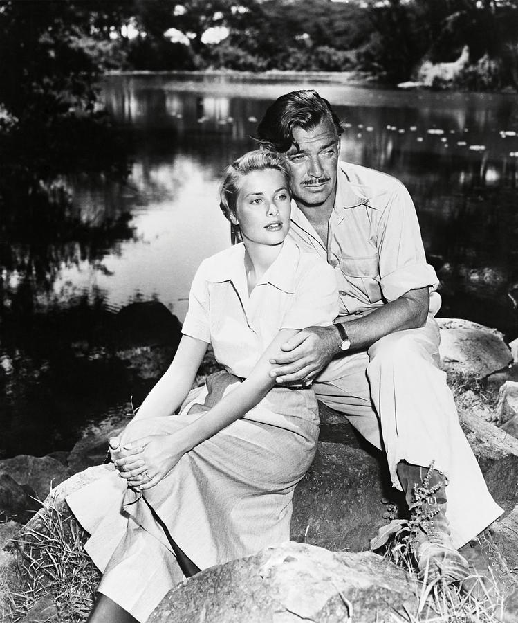 CLARK GABLE and GRACE KELLY in MOGAMBO -1953-. Photograph by Album