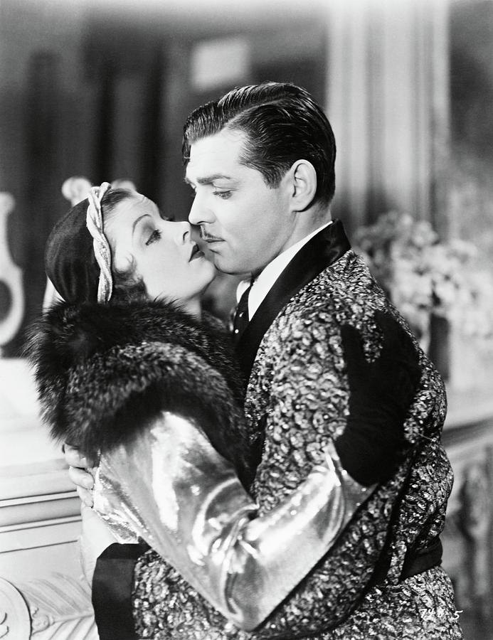 CLARK GABLE and MYRNA LOY in MANHATTAN MELODRAMA -1934-. Photograph by Album