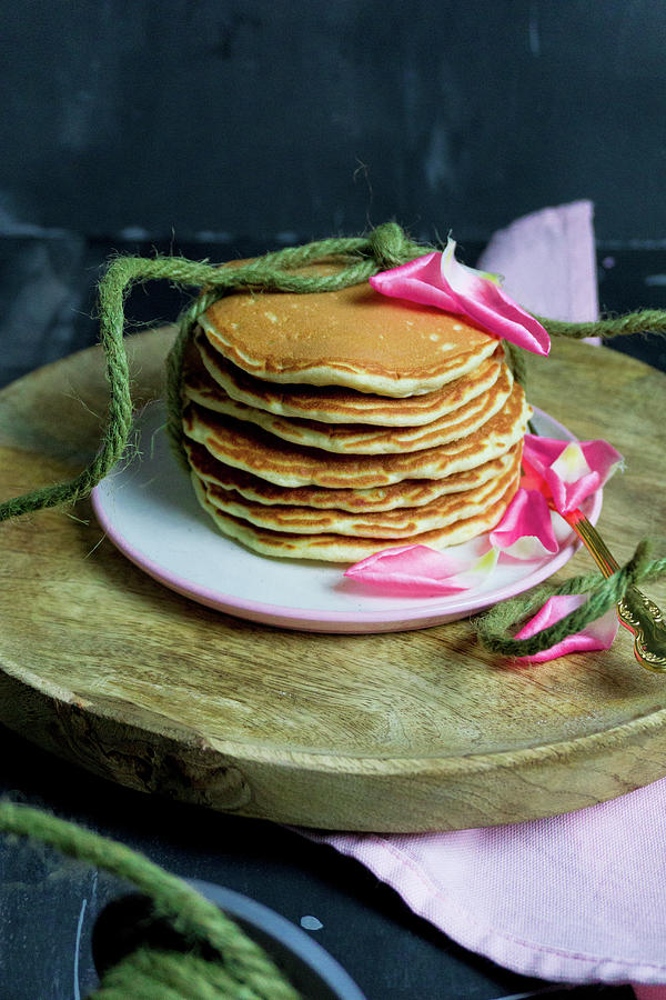 Classic Pancakes With Rose Petals Photograph by Elena Ecimovic
