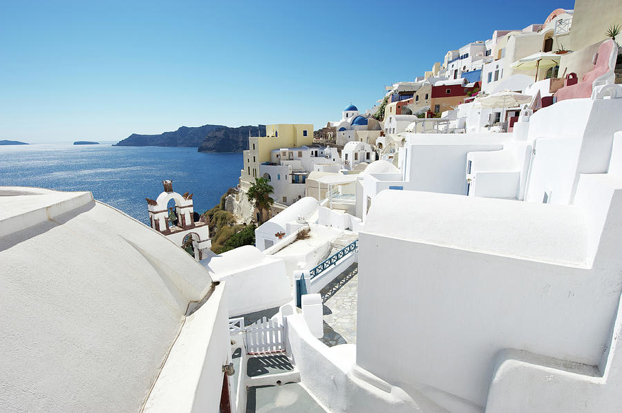 Classic View Of Whitewashed Oia Village Photograph by Peskymonkey