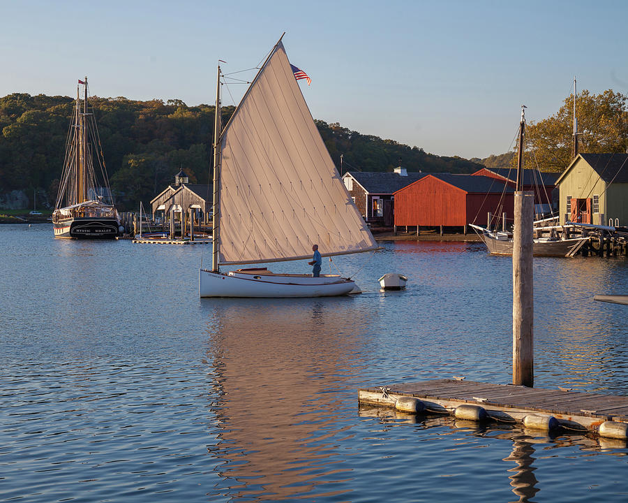 Classic Wooden boat in Mystic Seaport Photograph by Cliff Wassmann
