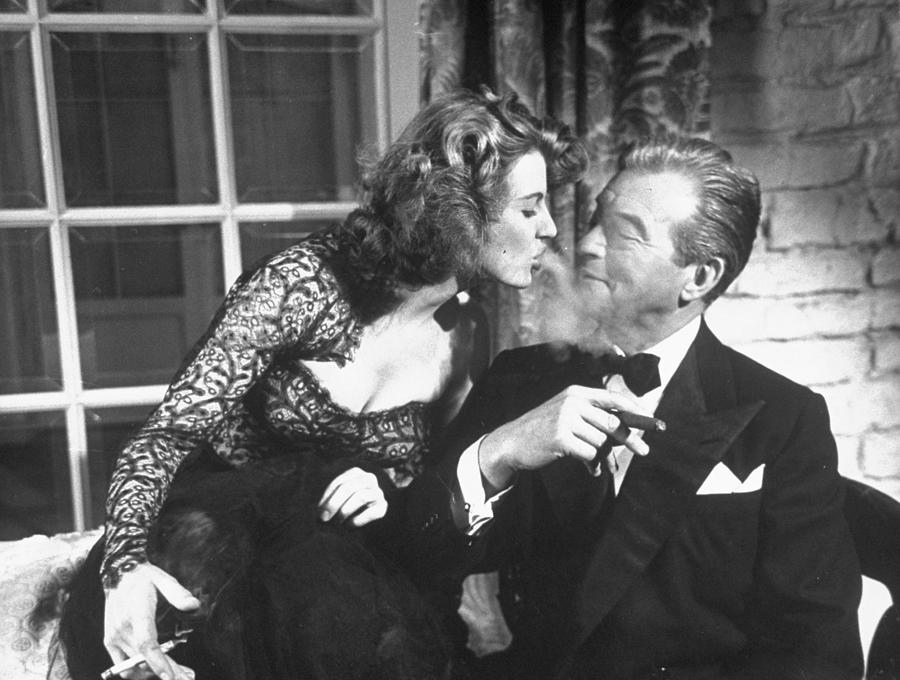 Claude Rains and Corinne Calvet Photograph by Peter Stackpole