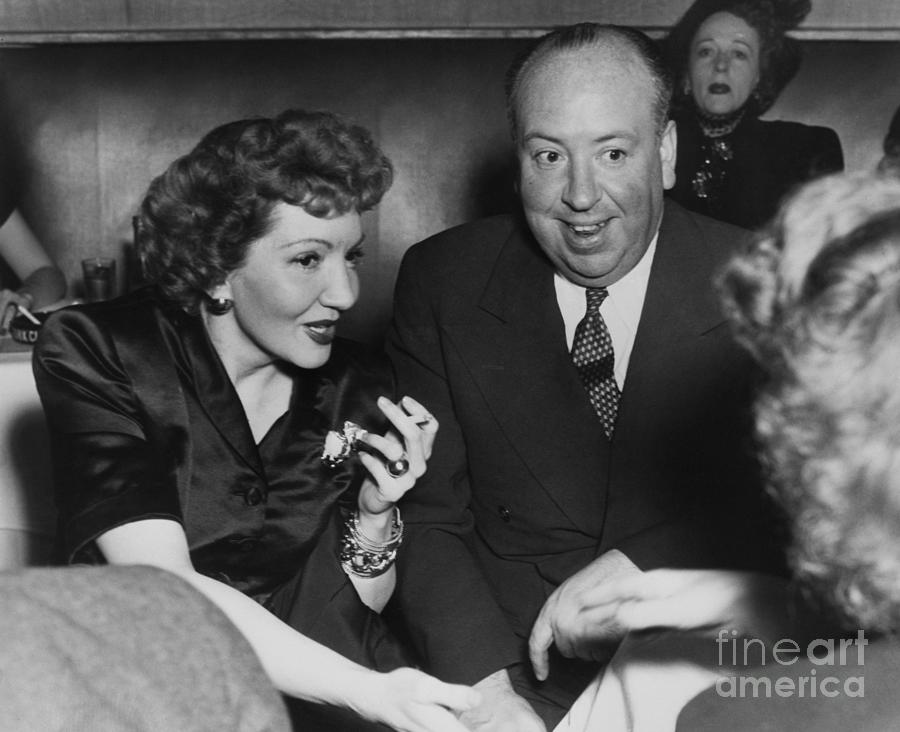 Claudette Colbert And Alfred Hitchcock Photograph by Bettmann