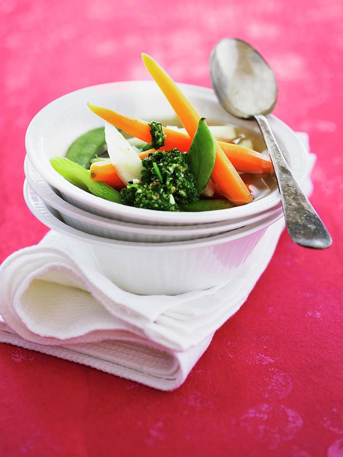 Clear Broth With Colourful Vegetables Photograph by Mikkel Adsbl