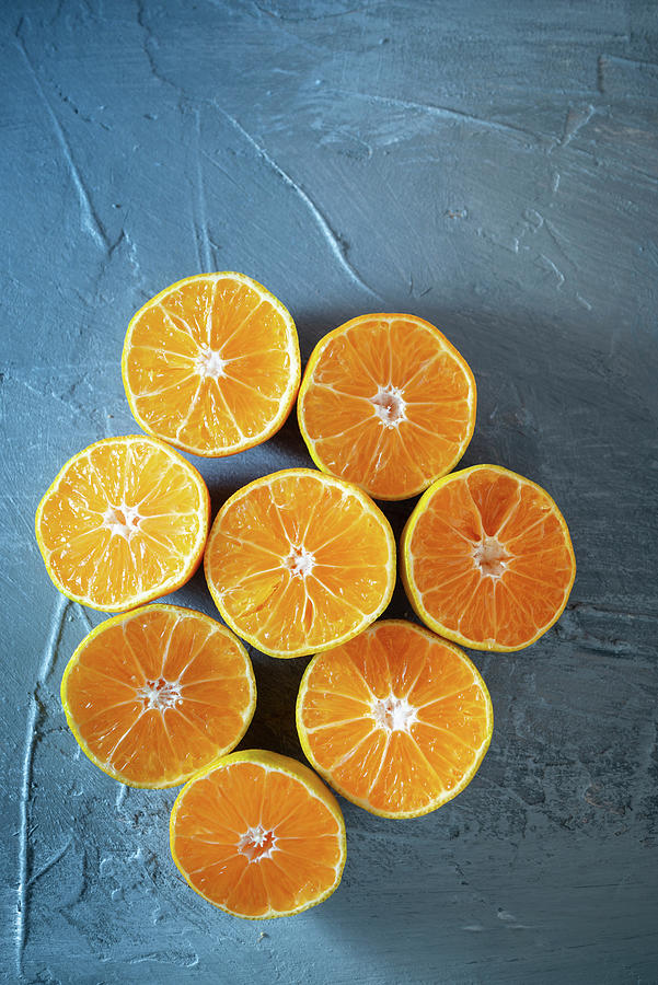 Clementines Cut In Half Photograph by Nitin Kapoor