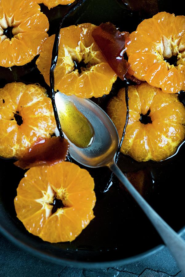Clementines In Caramel Syrup With Brandy And Vanilla Photograph by Hein Van Tonder