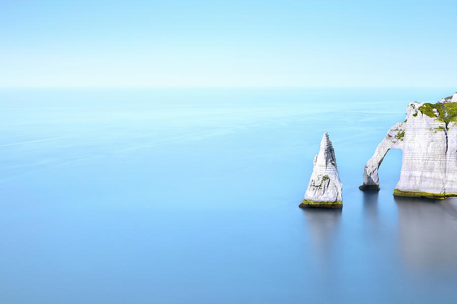Cliff In Sea Photograph by Christophe Kiciak