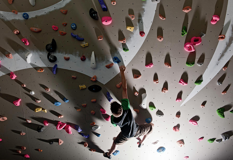 Climber Bouldering At Indoor Climbing Wall In London Photograph By Cavan Images Fine Art America